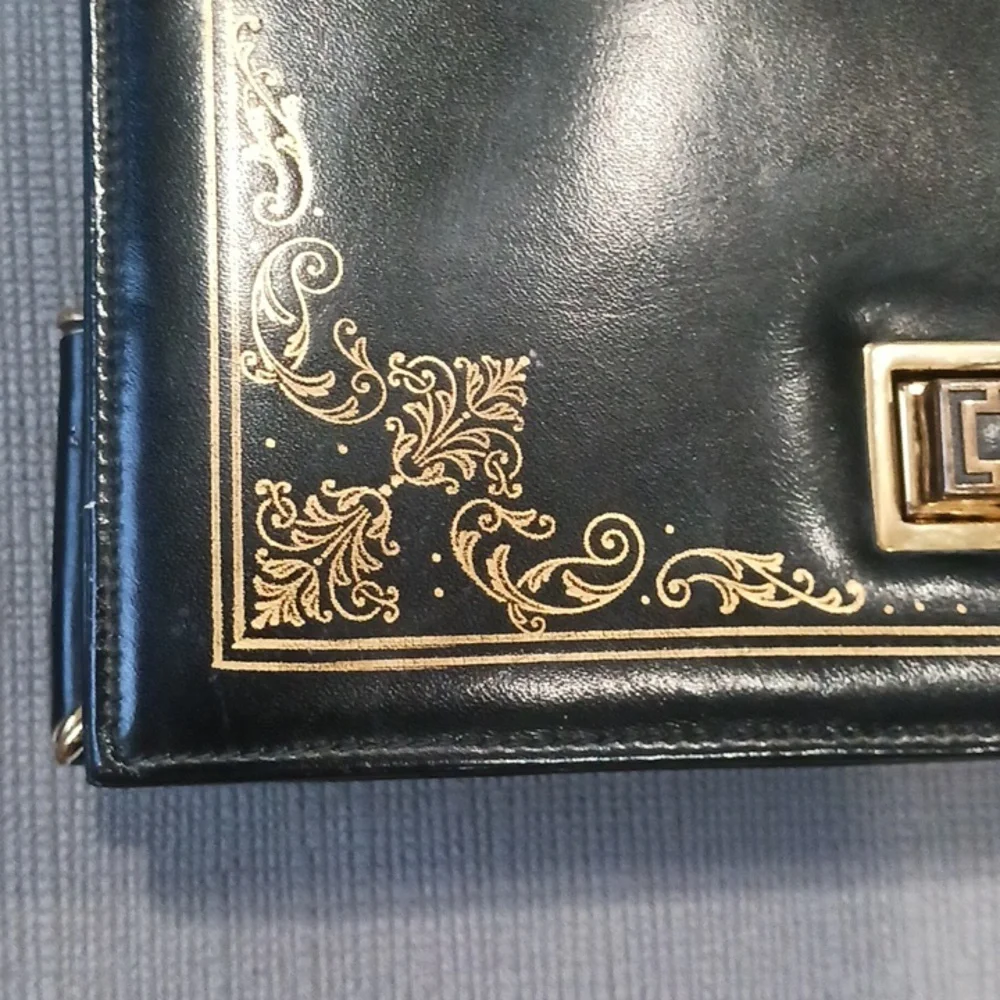 Black Shoulder Bag with Gold Accents
